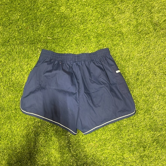 Men’s blue swim trunks with white piping and side zipper pocket - Picture 2 of 4